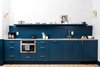 Modern home with Kitchen, Granite Counter, Undermount Sink, Light Hardwood Floor, Wall Lighting, and Colorful Cabinet. All rooms feature full kitchens. Photo 13 of Lokal Hotel