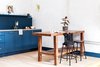 Modern home with Dining Room, Table, Wall Lighting, and Light Hardwood Floor. The hotel offers one and two bedroom apartments for your convenience and comfort. Photo 15 of Lokal Hotel