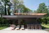 The Free Float Pool House's cantilevered steel creates a column-free shaded area. Photo 2 of Free Float Pool Cabana modern home