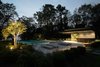 Landscape and a green wall provide an organic counterpoint to the Free Float Pool House's contemporary materials. Photo 3 of Free Float Pool Cabana modern home