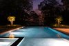 The pool, lighting, and landscape frame dramatic views of sunsets over the Long Island Sound. Photo 5 of Free Float Pool Cabana modern home