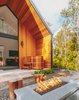 Modern home with Exterior, Metal Roof Material, House Building Type, Cabin Building Type, Gable RoofLine, and Wood Siding Material. Gas fire pit Photo 4 of Kūono at Volcano