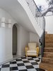 A small archway leads to the laundry and cellar. Photo 16 of Twin Peaks modern home