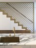 Another CNC routed aluminium panel, which continues the melodic theme of Schinkel’s fish scales adopted for the house, provides a contemporary solution to stair design that meets the building code.
© Sean Johnson
Photo 8 of Bougainvillea Row House modern home