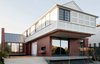 Porters Paints ‘Ox Red’ was applied to the masonry base, a memory of the hearth colour used in clay bricks. The white upper floor is pertinent to timber construction.
© Edward Birch Photo 6 of Balancing Home modern home