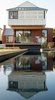 The bedroom wing appears to hang in the balance over the pool.
© Edward Birch Photo 5 of Balancing Home modern home