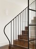 Dark oak treads and a fine classic steel balustrade provide a contrast against the white walls.
© Justin Alexander Photo 10 of Balancing Home modern home