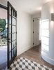 The Morning sun streams through the broadline glass. The curve of the wall reminds us of Corbusier’s motto: “Architecture is the mastery of correct and magnificent play of masses, brought together in light.”
© Edward Birch Photo 13 of Balancing Home modern home