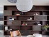 Modern home with Storage Room and Shelves Storage Type. A post-industrial bookshelf is without the obsolete television, and the books have become cups and saucers.
© Justin Alexander
Photo 14 of Balancing Home