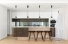 The joinery by Kitchen Trend with a toughened glass window as a splashback.
© Justin Alexander Photo 18 of The Pool House modern home