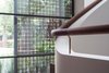 A timber handrail and masonry parapet follow the stair effortlessly, as if they had been formed with modelling clay.
© Edward Birch Photo 10 of Harbour Front-Row Seat modern home