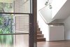 The entrance hall is bathed in light from the stairwell both day and night.
© Edward Birch Photo 9 of Harbour Front-Row Seat modern home