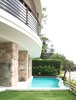 The bead blasted stainless steel balcony railings are a nautical reference to the naval architecture of the 1930s. the low iron glass behind it is to satisfy the Building Code of Australia.
© Edward Birch Photo 3 of Harbour Front-Row Seat modern home