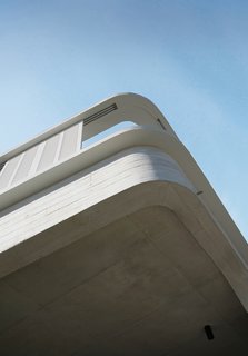 Due to the property's seaside location, the home was designed and constructed with various weather-resistant materials, including concrete and stainless steel.