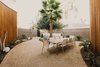 Modern home with Outdoor, Desert, Shrubs, Trees, Decomposed Granite Patio, Porch, Deck, and Stone Patio, Porch, Deck. Front courtyard extends living functions outside of the house, allowing the house to live much larger than its footprint Photo 19 of Curves House