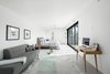 Modern home with Bedroom, Bed, Night Stands, and Porcelain Tile Floor. Pocketing glass doors open the master bedroom to the back yard Photo 10 of Schreiber House
