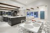 Modern home with Dining Room, Table, Chair, Porcelain Tile Floor, and Ceiling Lighting. Open living space Photo 11 of Schreiber House