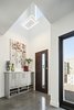 Modern home with Hallway and Concrete Floor. Double height entry Photo 3 of Uptown Row