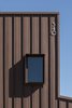 Modern home with Windows, Casement Window Type, and Metal. Custom Cor-Ten steel window box detail Photo 5 of Uptown Row