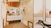 Modern home with Bath Room, Concrete Floor, Undermount Sink, Pendant Lighting, Porcelain Tile Wall, Enclosed Shower, Marble Counter, Ceiling Lighting, and Two Piece Toilet. Master bathroom featuring a steam shower Photo 2 of Curves House