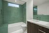 Modern home with Bath Room, Undermount Sink, Porcelain Tile Floor, Alcove Tub, Engineered Quartz Counter, Open Shower, Ceiling Lighting, Two Piece Toilet, and Glass Tile Wall. Main bathroom Photo 20 of Sol House