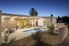 Modern home with Outdoor, Side Yard, Desert, Small Pools, Tubs, Shower, and Decomposed Granite Patio, Porch, Deck. Overall view of the courtyard that extends the livable area of the home Photo 17 of Sol House