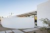 Modern home with Outdoor, Decomposed Granite Patio, Porch, Deck, Desert, Walkways, and Side Yard. A curved wall shields the courtyard beyond Photo 7 of Sol House