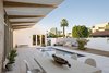 Modern home with Outdoor, Side Yard, Small Pools, Tubs, Shower, Trees, Hardscapes, Pavers Patio, Porch, Deck, Decomposed Granite Patio, Porch, Deck, and Desert. A 10 foot deep cantilevered roof provides consistent shade pool side in the courtyard Photo 3 of Sol House