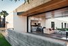 Modern home with Trees, Front Yard, Grass, Ceiling Lighting, Concrete Floor, Concrete Patio, Porch, Deck, and Outdoor. A board formed concrete wall creates a solid barrier off of the open living space to allow the homeowner to feel safe yet open to the community Photo 10 of Link House