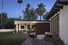 Modern home with Exterior, House, and Mid-Century Building Type. Outdoor fire pit extends living outside Photo 9 of Modern Manor