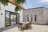 Modern home with Outdoor, Desert, Decomposed Granite Patio, Porch, Deck, Side Yard, and Hardscapes. Canal Courtyard off of the living area Photo 14 of Canal House