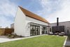 Modern home with Outdoor, Back Yard, Grass, Desert, Decomposed Granite Patio, Porch, Deck, Horizontal Fences, Wall, and Metal Fences, Wall. Central Courtyard Photo 19 of Canal House