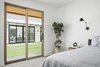 Modern home with Bedroom, Bed, Night Stands, Wall Lighting, and Concrete Floor. View from the master bedroom across the central courtyard Photo 13 of Canal House