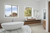 Freestanding tub and custom vanities with views of Camelback Mountain Photo 3 of Cliff House modern home
