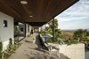 Modern home with Outdoor, Concrete Patio, Porch, Deck, Large Patio, Porch, Deck, Desert, Front Yard, Small Pools, Tubs, Shower, and Decomposed Granite Patio, Porch, Deck. A hot tub off the new covered patio and stairs leading down to the pool Photo 9 of Red Rocks