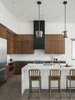 Modern home with Recessed Lighting, Pendant Lighting, and Concrete Floor. The custom, metal clad hood draws the eye up to the full height of the ceiling Photo 15 of Pleats