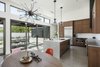 Modern home with Pendant Lighting and Concrete Floor. A small dining space sits off to the side of the kitchen Photo 13 of Pleats