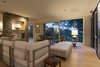 Living Room with fireplace, looking at the Dining Room Photo 9 of Martha's Vineyard Beach House modern home