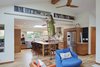 Modern home with Kitchen, Engineered Quartz Counter, Light Hardwood Floor, Wood Cabinet, Ceramic Tile Backsplashe, Recessed Lighting, Pendant Lighting, Refrigerator, Microwave, Dishwasher, and Undermount Sink. Kitchen + Library Ladder Photo 8 of Selby Residence