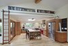 Modern home with Kitchen, Engineered Quartz Counter, Wood Cabinet, Ceramic Tile Backsplashe, Recessed Lighting, Light Hardwood Floor, Pendant Lighting, Refrigerator, Range Hood, Range, Microwave, Wine Cooler, Dishwasher, and Undermount Sink. Kitchen Photo 6 of Selby Residence