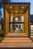 Modern home with Exterior, Wood Siding Material, Flat RoofLine, and House. New entry addition showcasing the beautiful wood cladding. Photo 3 of Ranger’s Ridge