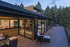 Modern home with Exterior, Shingles Roof Material, House, Gable RoofLine, and Wood Siding Material. The rear deck near the canyon bluff overlooks the Deschutes River. Photo 8 of Ranger’s Ridge
