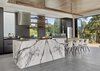 Modern home with Kitchen, Range Hood, Refrigerator, and Marble Counter. The cabinets are black matte glass by Leicht. The floating walnut table, shelves and light are by Matt Eastvold. Photo 5 of Trestle Glen Modern