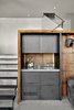 Modern home with Living Room, Bar, and Concrete Floor. The wetbar area features custom steel cabinets by Metropolis Metalworks, and the burled redwood paneling and slab, sourced via Aborica and fabricated by Artistic Veneers. Photo 2 of Twin Peaks Escape Pad
