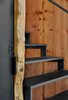 Modern home with Staircase, Metal Railing, and Metal Tread. Detail showing the industrial nature of the project, including raw steel and live edge burled Redwood Slabs Photo 8 of Twin Peaks Escape Pad