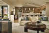 Modern home with Kitchen, Range Hood, Engineered Quartz Counter, Wood Cabinet, Medium Hardwood Floor, and Pendant Lighting. Kitchen/Family Room Photo 4 of Union Bay Residence