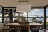Modern home with Dining Room, Table, Chair, Pendant Lighting, and Medium Hardwood Floor. Breakfast Nook Photo 5 of Union Bay Residence