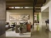 Modern home with Living Room, Sofa, Coffee Tables, End Tables, and Concrete Floor. Living Room with Den beyond Photo 6 of Union Bay Residence