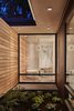 Modern home with Bath Room, Concrete Floor, Freestanding Tub, Enclosed Shower, Pendant Lighting, and Stone Slab Wall. Master Bath Photo 9 of Union Bay Residence