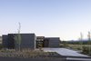 Modern home with Exterior, Flat RoofLine, House Building Type, and Wood Siding Material. Street view Photo 2 of High Desert Modern